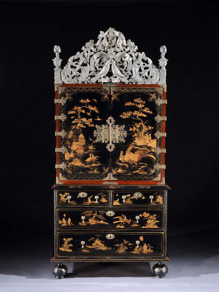 A William and Mary black japanned cabinet on chest